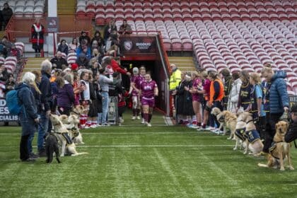 discover how guide dog puppies support and guard while empowering premier women's rugby teams. a unique look at training, teamwork, and dedication.